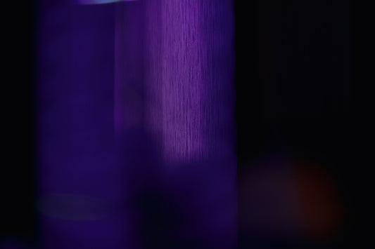 a purple light in the dark