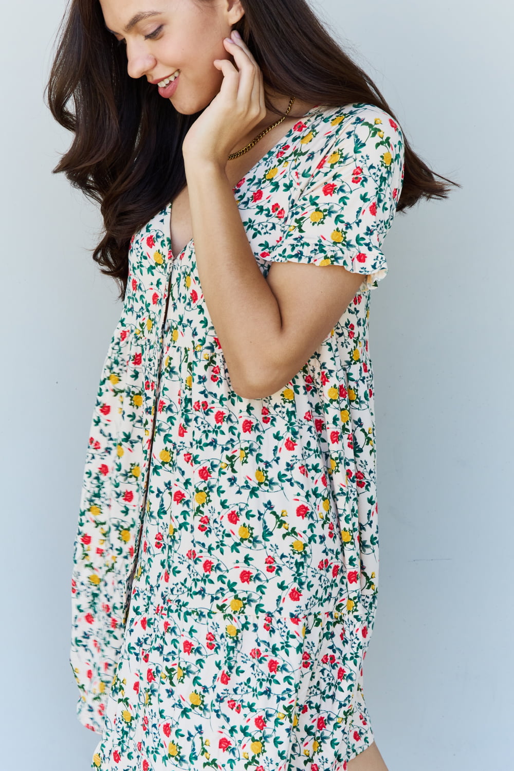 Follow Me Full Size V-Neck Ruffle Sleeve Floral Dress